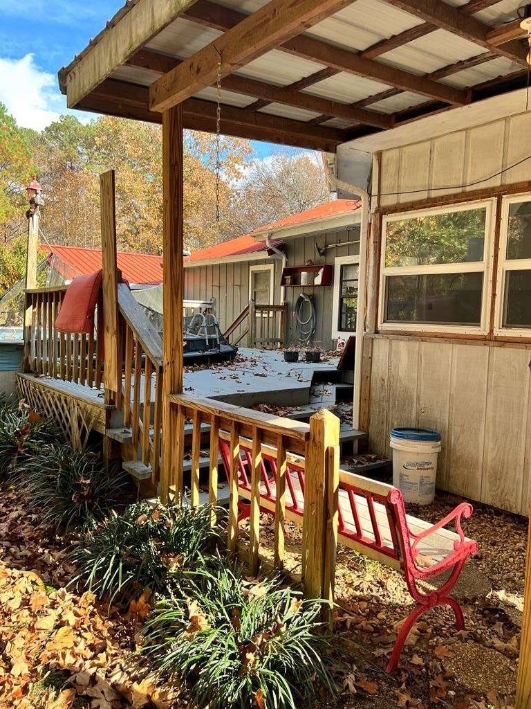 2034 Old River Road Charleston, TN 37310 - Photo 28 of 29 a view of a chairs and table in the patio