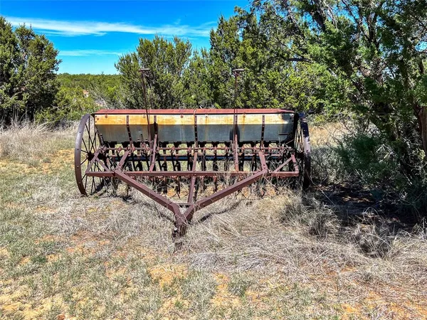 a view of outdoor space with iron fence