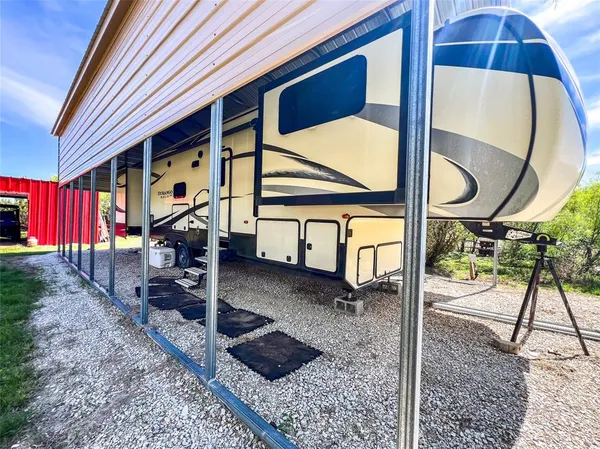 a view of a backyard of a house