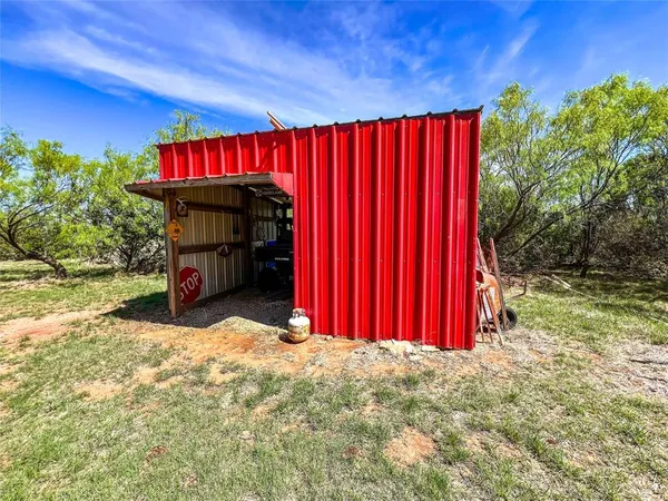 a view of entryway with a table and chairs
