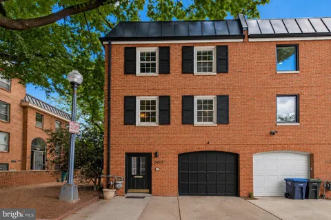 a front view of a house with a garage