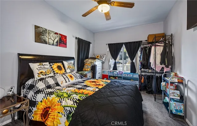 a bed room with a bed and a walk in closet