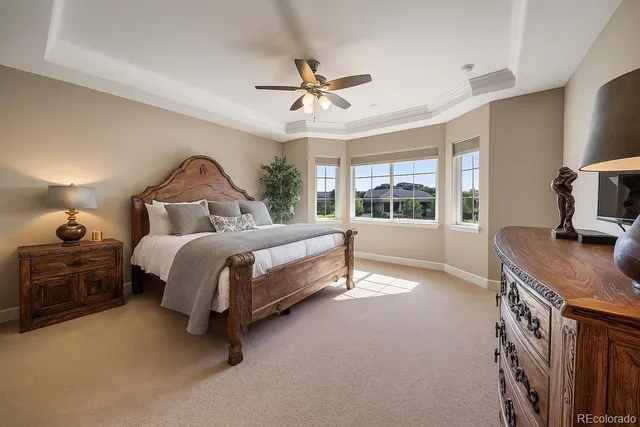 a bed room with a bed and a tv