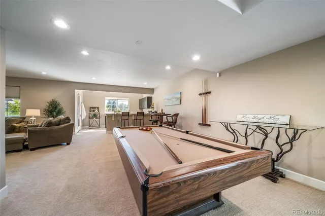 a living room with furniture and a table