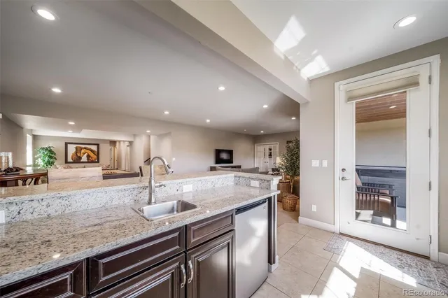 a kitchen with counter top space cabinets and stainless steel appliances