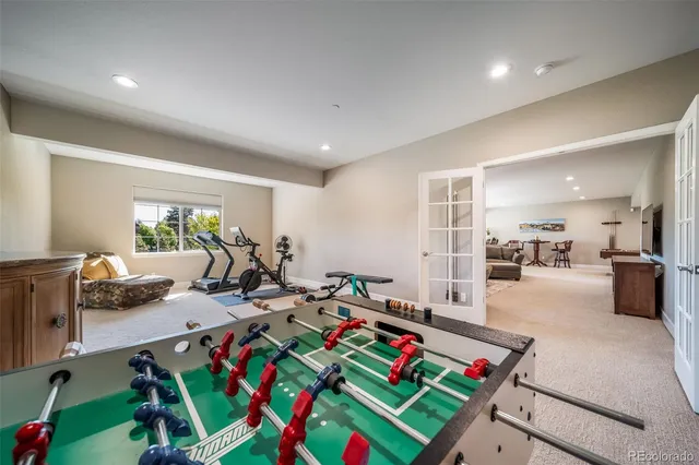 a bed room with furniture and a table