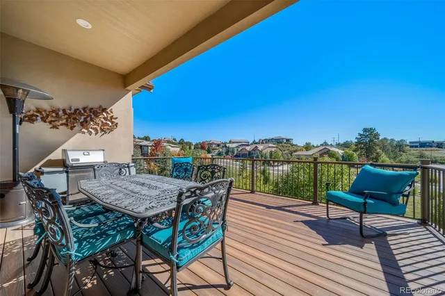 a view of a terrace with furniture