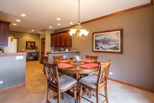 293 Ridge Road North Aurora, IL 60542 - Photo 6 of 21 a dining room with furniture and window