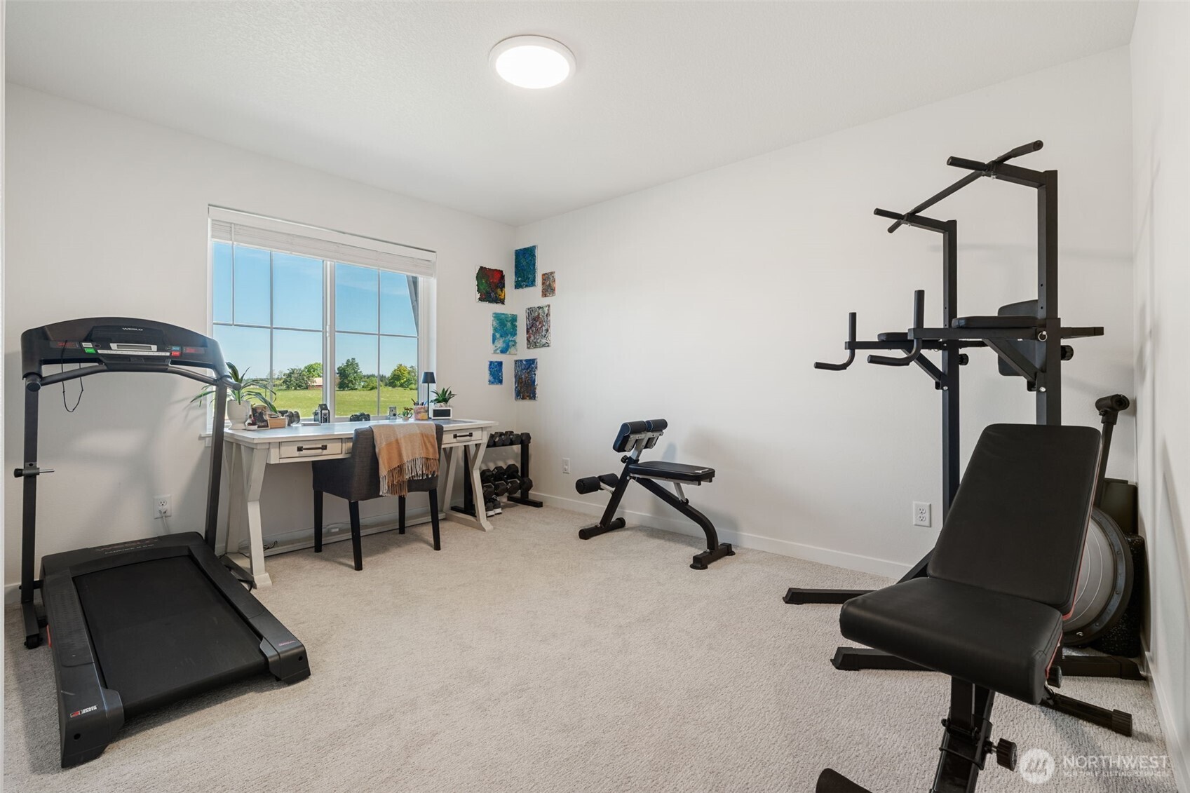 1090 Rw Fletcher Street Winlock, WA 98596 - Photo 20 of 37 a room with a chair and gym equipment
