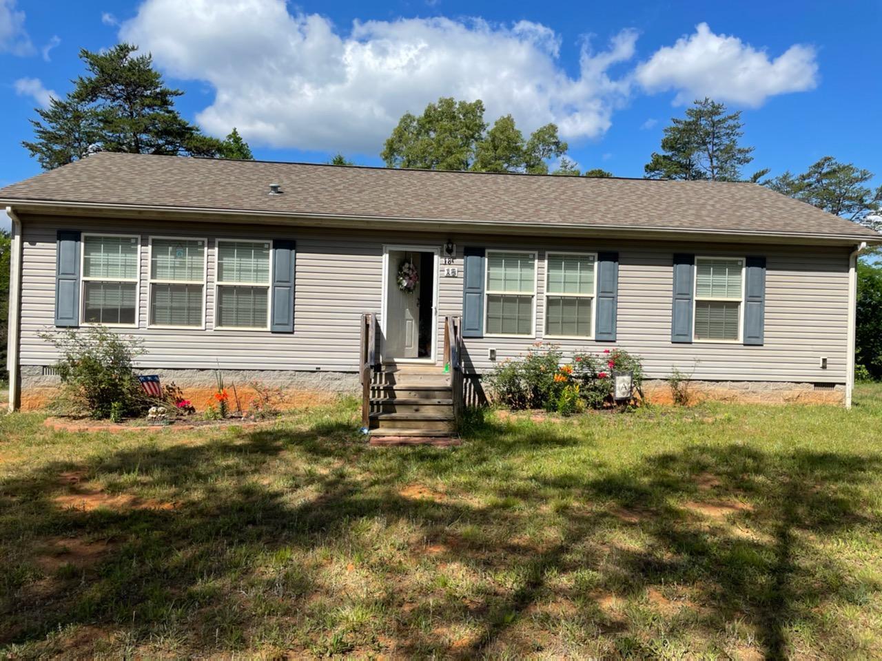 18 Barrett Road Hardy, VA 24101 - Photo 1 of 1 a backyard of a house with yard and barbeque oven