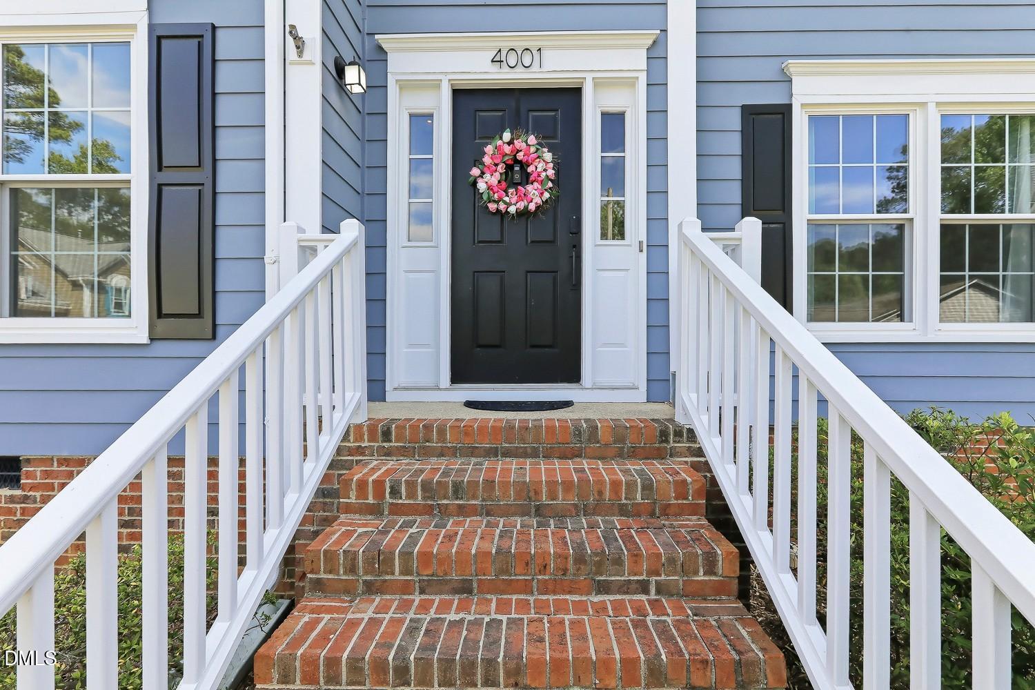4001 Batiste Road Raleigh, NC 27613 - Photo 4 of 63 a view of a balcony with wooden floor