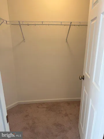 a view of small space with racks on the wall