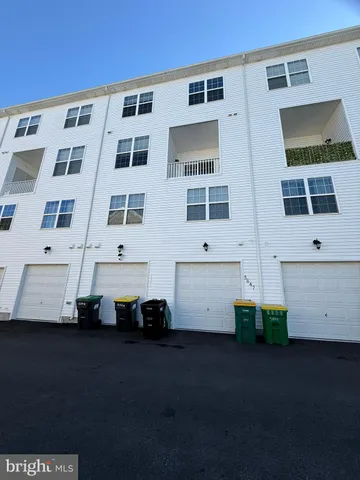 a view of a car park in front of a building