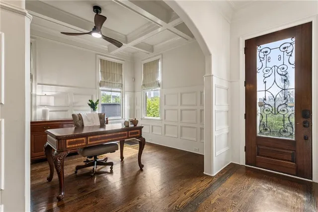 a view of a dining room with furniture window and wooden floor