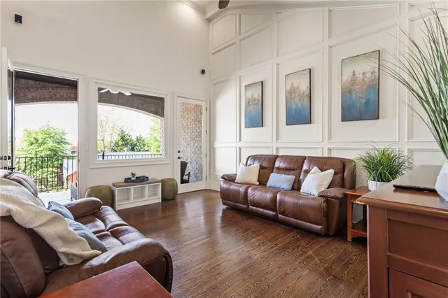 a bathroom with a granite countertop bathtub shower sink and mirror