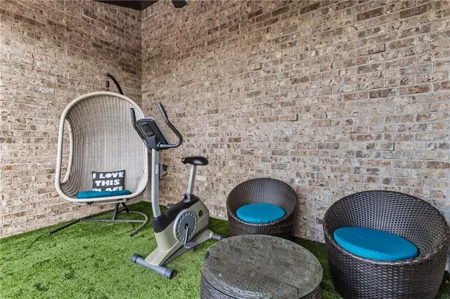 a view of a hallway with washer and dryer