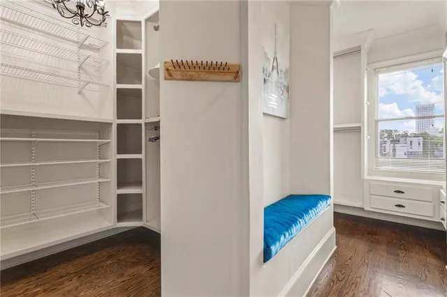 a view of a roof deck with furniture