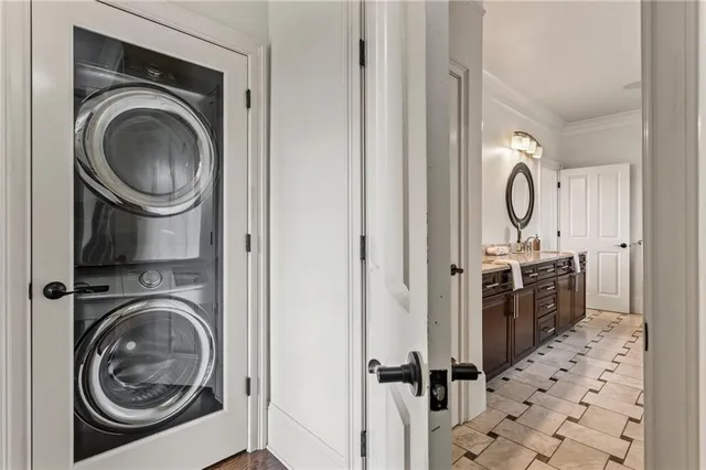 a view of a balcony with table and chairs
