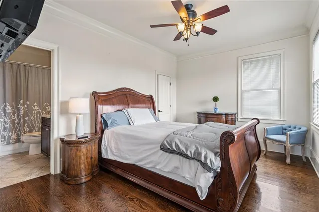 a view of a house with a yard balcony and furniture