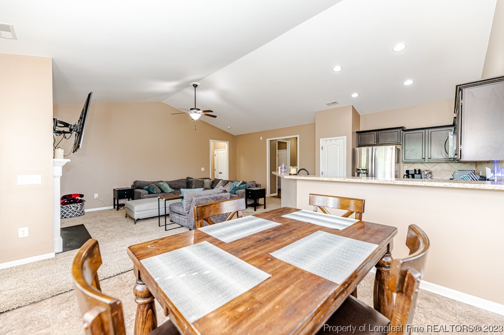 463 Juno Drive Broadway, NC 27505 - Photo 12 of 30 a living room with furniture and a table
