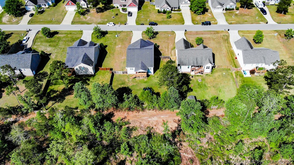 463 Juno Drive Broadway, NC 27505 - Photo 30 of 30 an aerial view of residential houses with outdoor space and trees