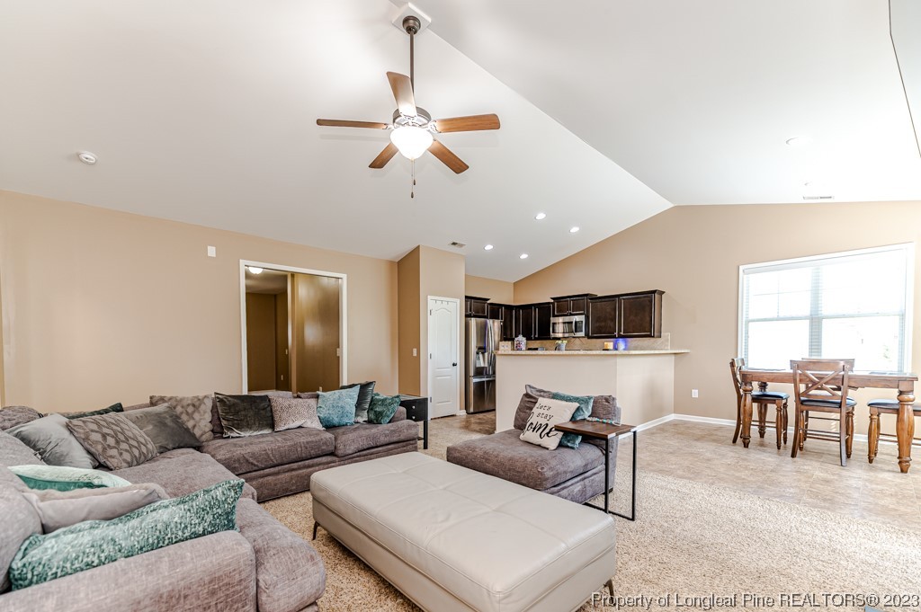 463 Juno Drive Broadway, NC 27505 - Photo 6 of 30 a living room with furniture and kitchen view