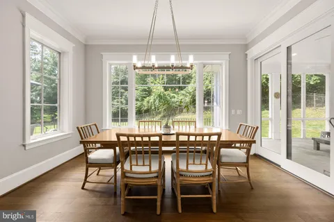 a living room with furniture and windows