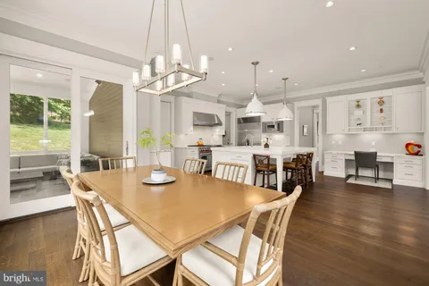 a view of entryway with wooden floor and window