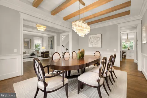 a living room with fireplace furniture and a flat screen tv