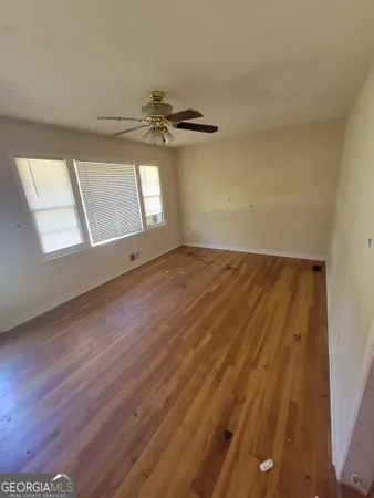 an empty room with windows