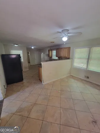 a view of a kitchen with a sink