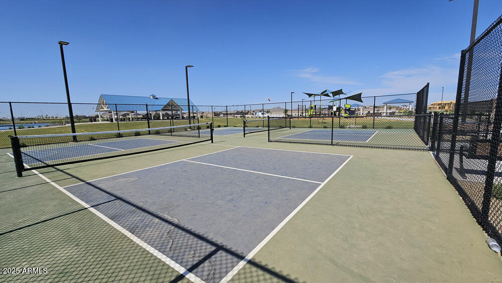 2654 Rustler Road San Tan Valley, AZ 85140 - Photo 20 of 38 a view of a tennis court with basket ball court