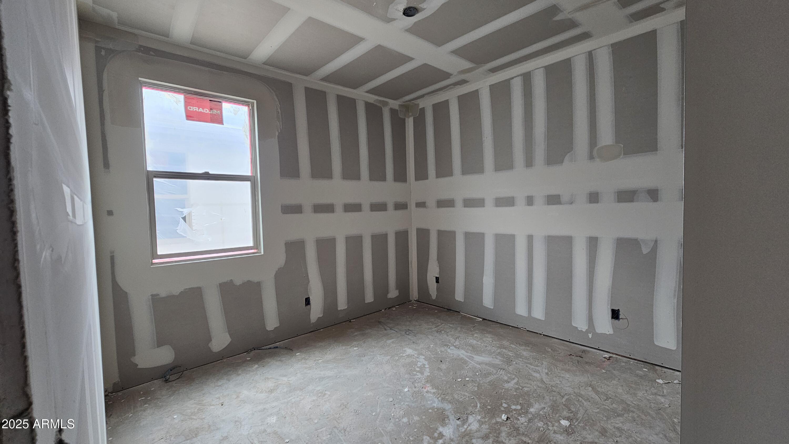 2654 Rustler Road San Tan Valley, AZ 85140 - Photo 6 of 38 a view of an empty room