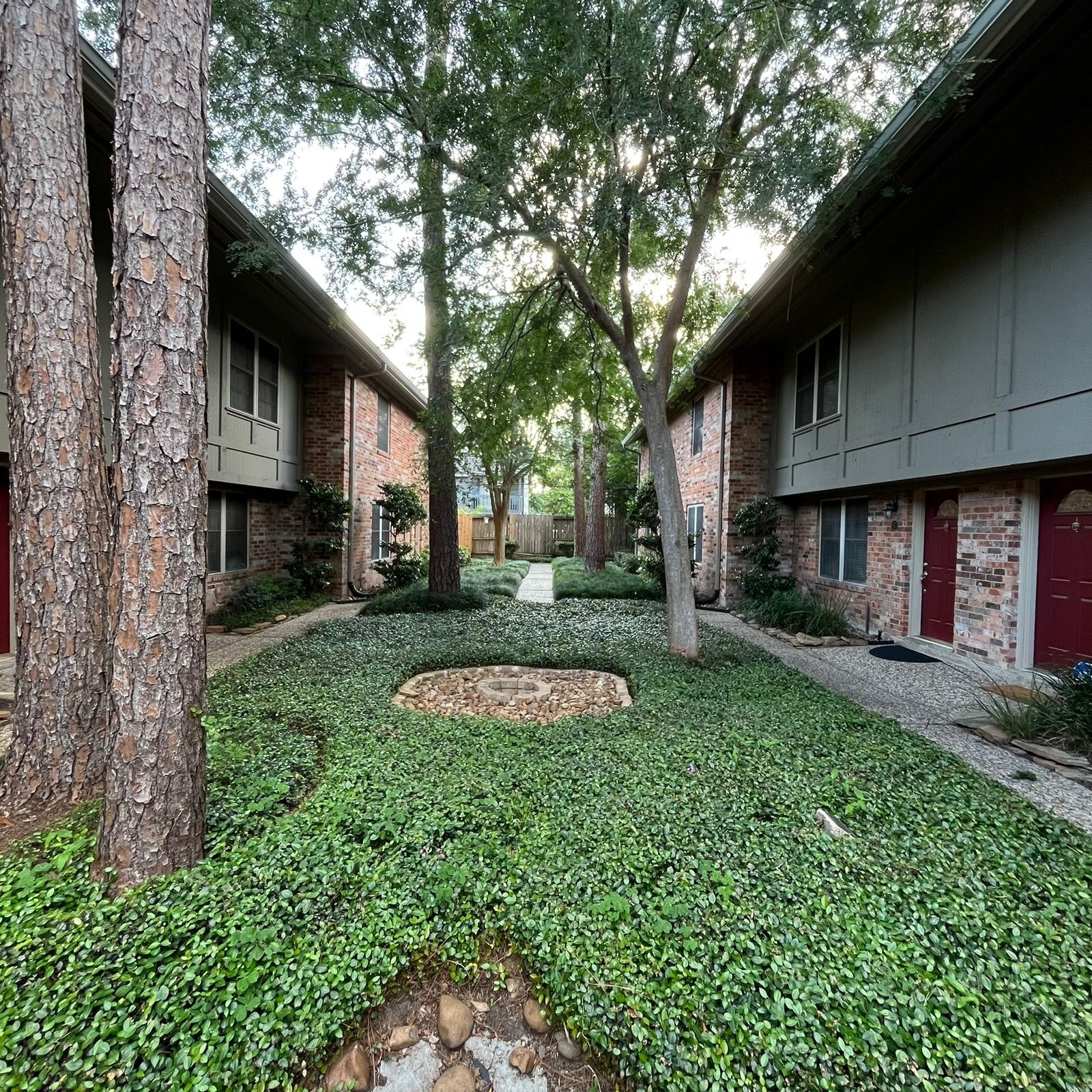 515 Tallowood Road, Unit 55 Houston, TX 77024 - Photo 3 of 18 a view of a house with a yard