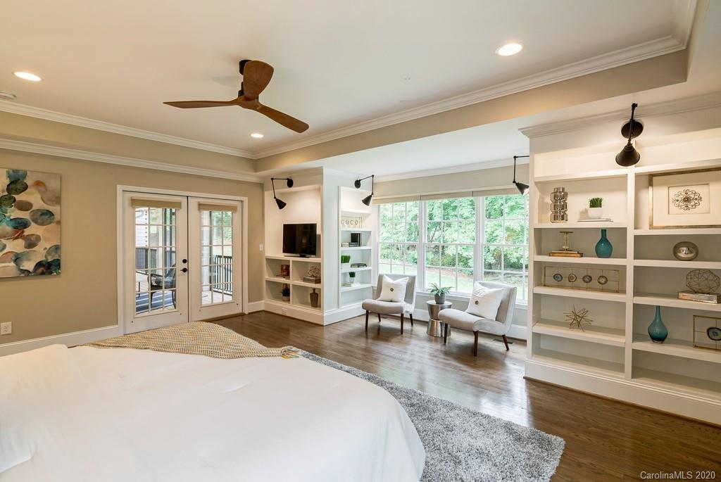 4200 Chelmsford Road Charlotte, NC 28211 - Photo 12 of 45 a bed room with a bed and a television