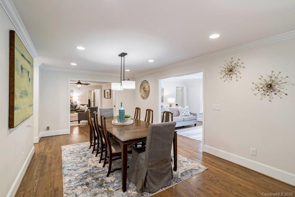 4200 Chelmsford Road Charlotte, NC 28211 - Photo 21 of 45 a view of a a dining room with furniture window and wooden floor