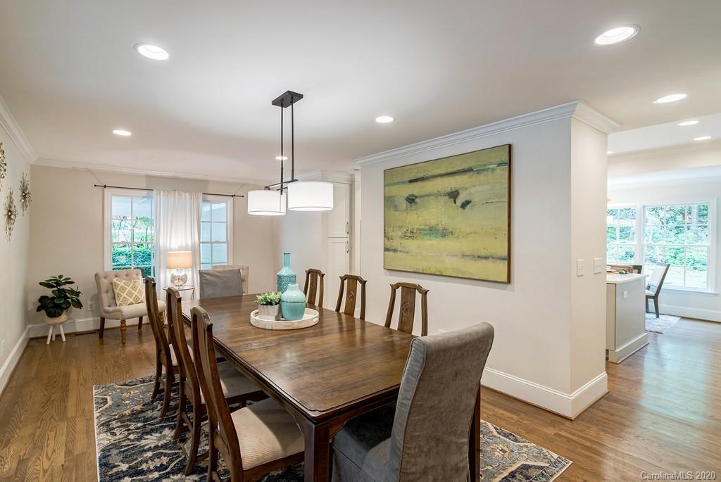 4200 Chelmsford Road Charlotte, NC 28211 - Photo 23 of 45 a view of a dining room with furniture window and wooden floor