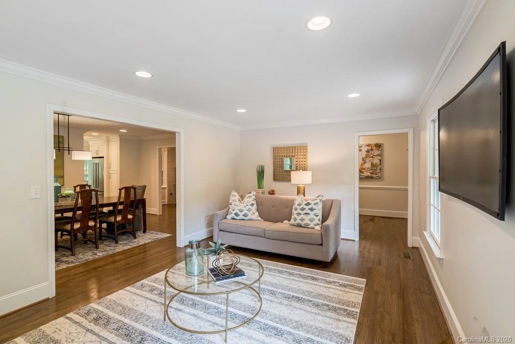 4200 Chelmsford Road Charlotte, NC 28211 - Photo 29 of 45 a living room with furniture and wooden floor