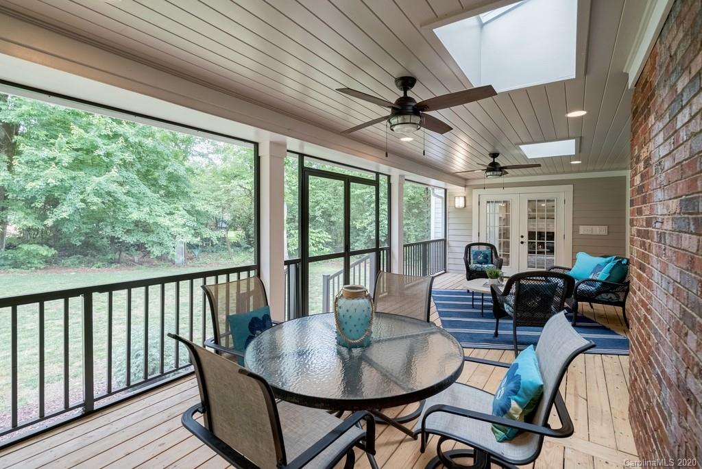 4200 Chelmsford Road Charlotte, NC 28211 - Photo 30 of 45 a living room with furniture and a large window