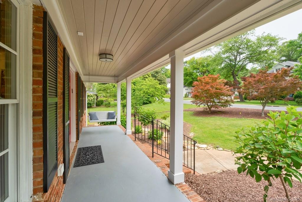 4200 Chelmsford Road Charlotte, NC 28211 - Photo 4 of 45 a view of a porch with furniture and garden