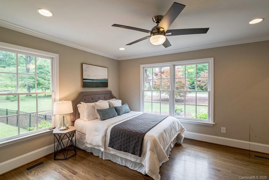 4200 Chelmsford Road Charlotte, NC 28211 - Photo 31 of 45 a bedroom with a large bed and a window