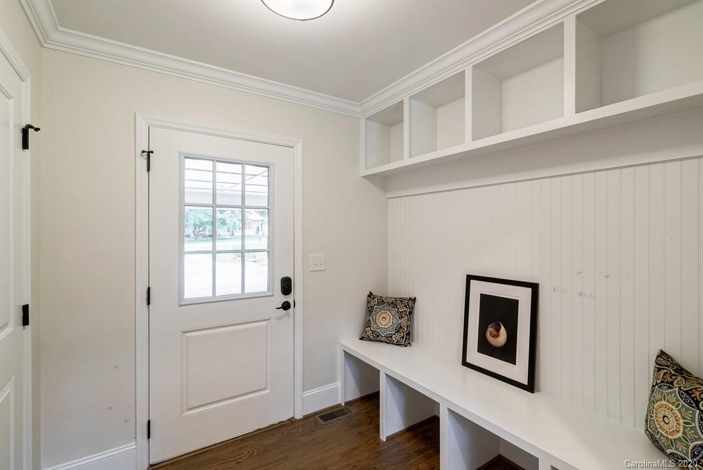 4200 Chelmsford Road Charlotte, NC 28211 - Photo 32 of 45 a view of room with window and wooden floor