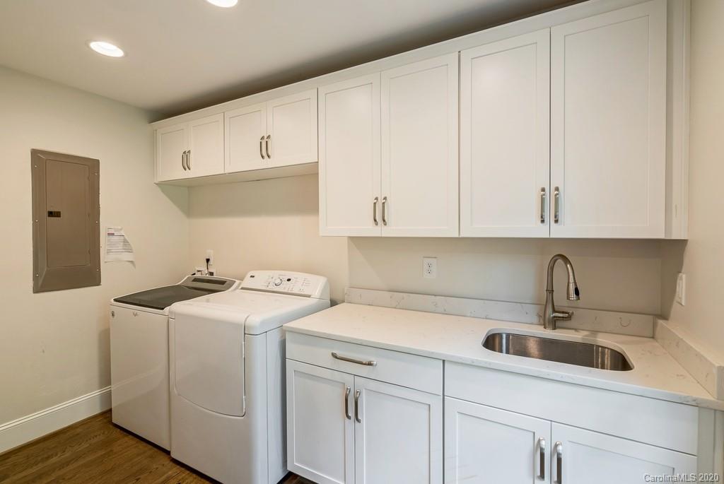 4200 Chelmsford Road Charlotte, NC 28211 - Photo 34 of 45 a view white cabinets and sink