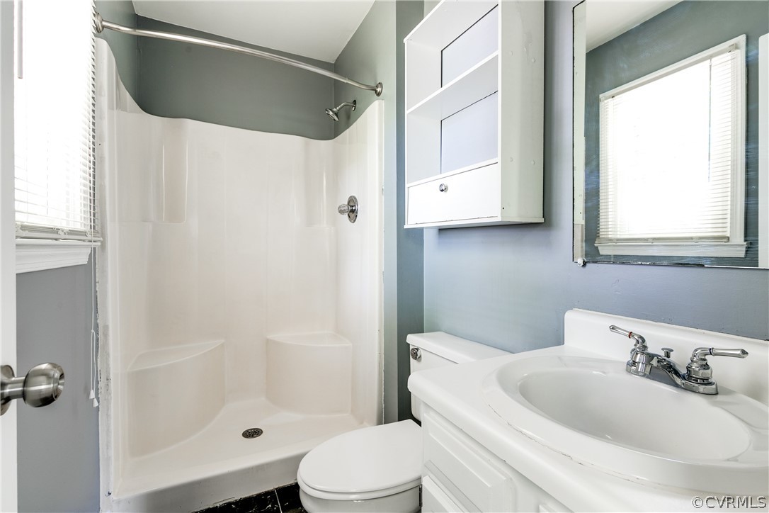 6430 Jessup Road Chesterfield, VA 23832 - Photo 16 of 26 a bathroom with a sink toilet and shower