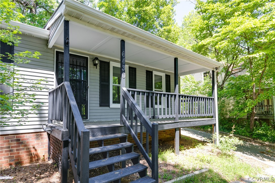 6430 Jessup Road Chesterfield, VA 23832 - Photo 2 of 26 a balcony with wooden floor and outdoor space