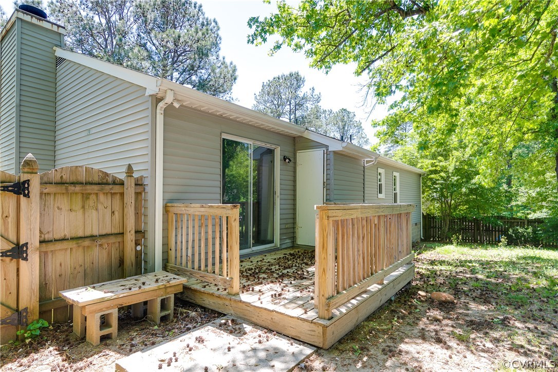 6430 Jessup Road Chesterfield, VA 23832 - Photo 24 of 26 a view of backyard with a wooden fence