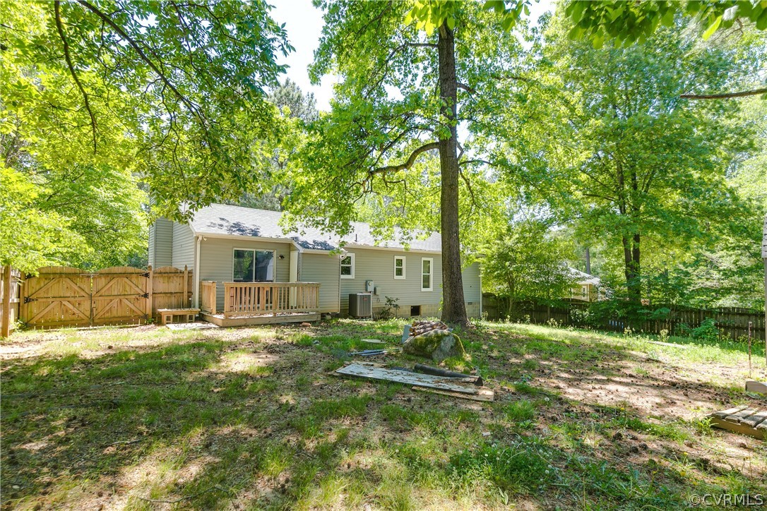 6430 Jessup Road Chesterfield, VA 23832 - Photo 25 of 26 a backyard of a house with table and chairs