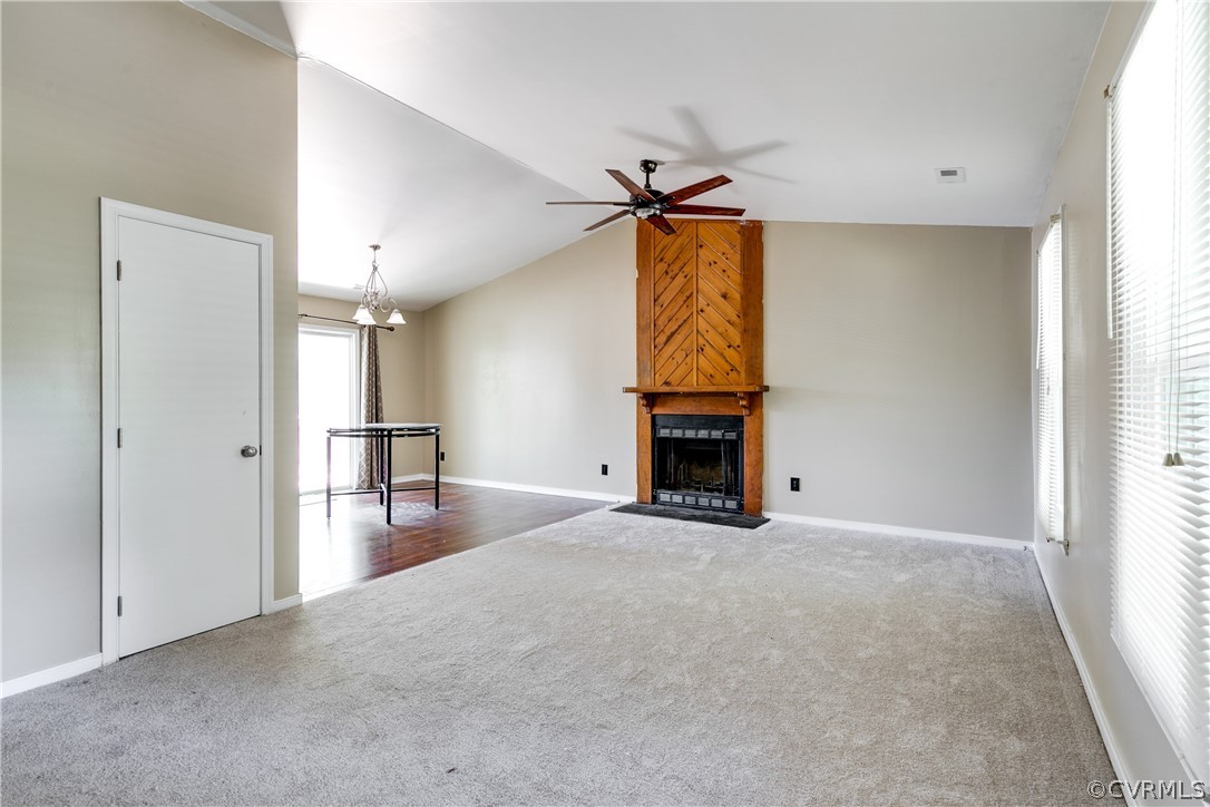 6430 Jessup Road Chesterfield, VA 23832 - Photo 4 of 26 an empty room with fireplace and a window