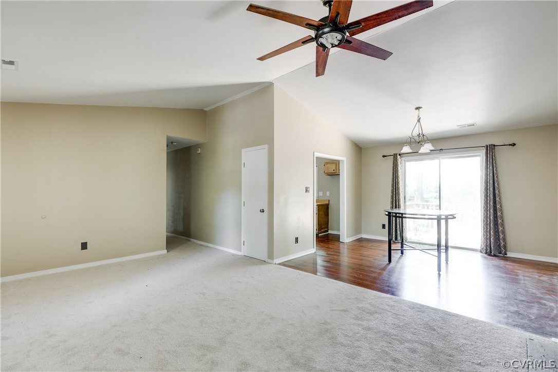 6430 Jessup Road Chesterfield, VA 23832 - Photo 5 of 26 an empty room with wooden floor and windows