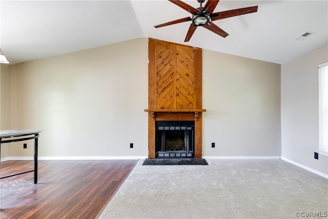 6430 Jessup Road Chesterfield, VA 23832 - Photo 6 of 26 a view of a livingroom with a fireplace and wooden floor